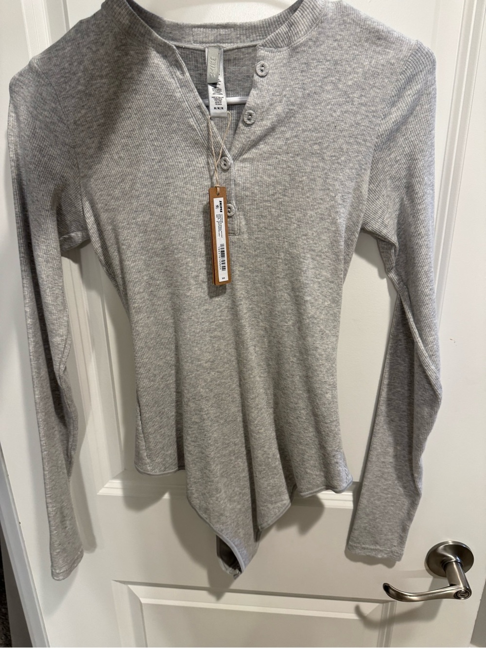 Skims cotton rib long sleeve henley bodysuit